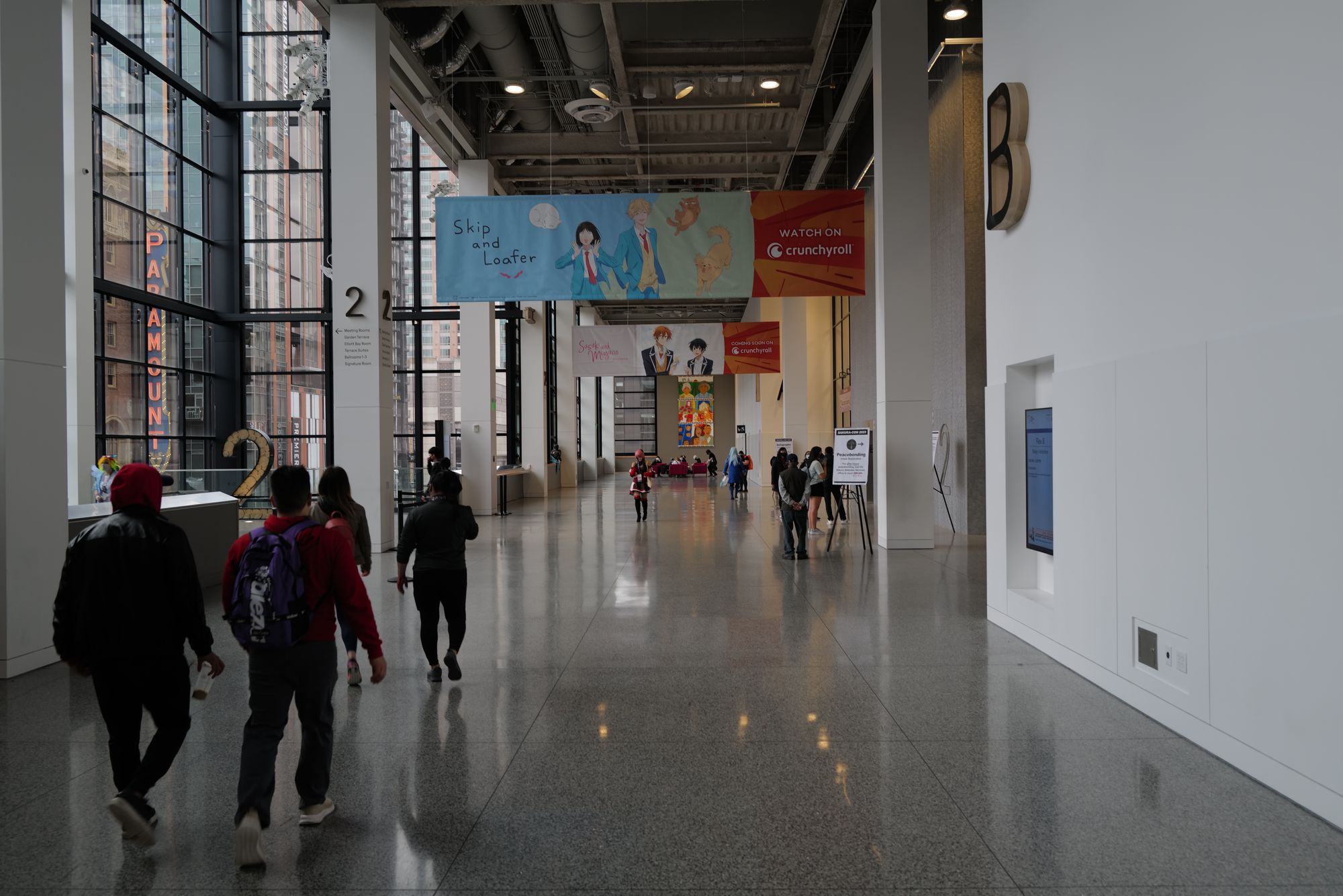 Quiet hallways in the Seattle Convention Center, with anime banners hanging overhead